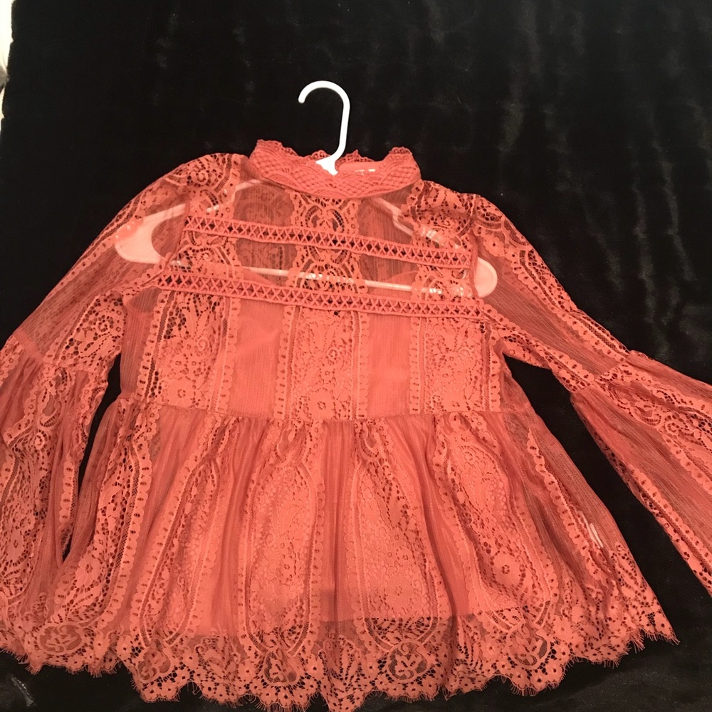 Lace bell-sleeved top